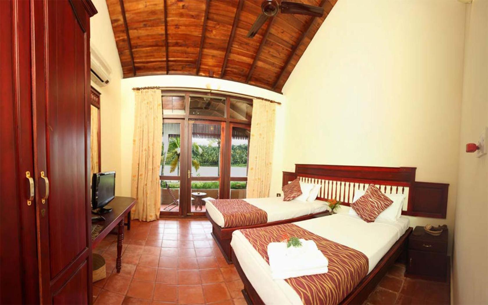 Fragrant Nature Backwater Resort & Ayurveda Spa Kollam Rom bilde